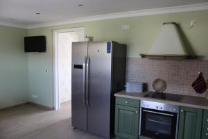 Kuchyň nebo kuchyňský kout v ubytování Ferienwohnung auf dem Bauernhof