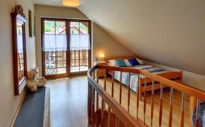 Postel nebo postele na pokoji v ubytování Apartamenty Sun & Ski Willa Nadrzeczna 2B centrum