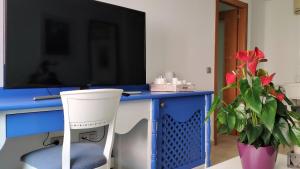 Televízia a/alebo spoločenská miestnosť v ubytovaní Fuerteventura - Apartamento Ciudad 2.3