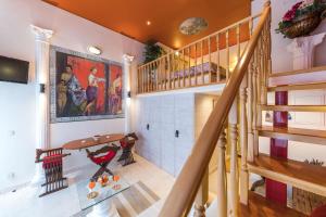 a staircase in a home with a stair case at Apartment Ave Caesar in Split