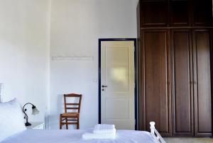 Posteľ alebo postele v izbe v ubytovaní Drymonas Heights Kythira Traditional Volto