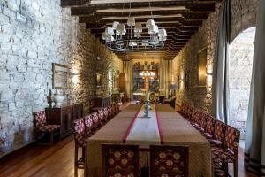 a conference room with a long table and chairs at Parador de Hondarribia in Hondarribia