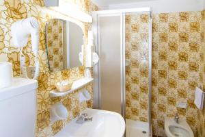Koupelna v ubytování Chalet Madrisa + 37 fotografií