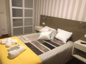 Posteľ alebo postele v izbe v ubytovaní Residencia Compostela