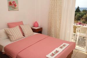 Cama o camas de una habitación en Kastoria Hotel Apartments