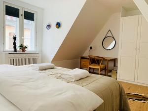 A bed or beds in a room at Luxury apartment in the heart of Copenhagen