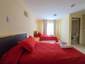 Ένα ή περισσότερα κρεβάτια σε δωμάτιο στο Hostel Pioneros del Valle