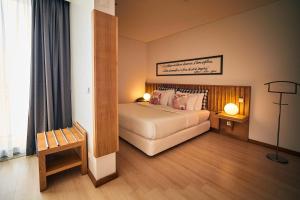 Кровать или кровати в номере Hotel Praia Marina by RIDAN Hotels +37 фотографий