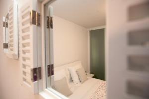 Posteľ alebo postele v izbe v ubytovaní Dream Apartment