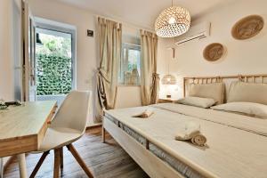Postel nebo postele na pokoji v ubytování Pikarin rooms B&B