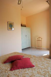 Posteľ alebo postele v izbe v ubytovaní Casa Donatella sulla costa degli Etruschi