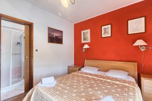 Postel nebo postele na pokoji v ubytování Villa Sofia