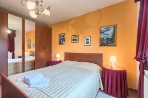 Postel nebo postele na pokoji v ubytování Villa Sofia