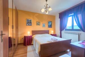 Postel nebo postele na pokoji v ubytování Villa Sofia + 27 fotografií