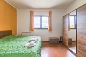 Postel nebo postele na pokoji v ubytování Villa Sofia
