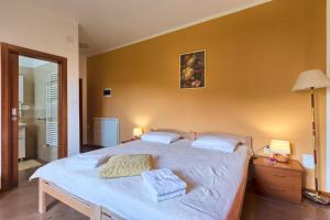 Postel nebo postele na pokoji v ubytování Villa Sofia
