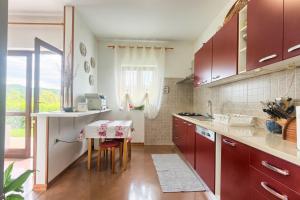 Kuchyň nebo kuchyňský kout v ubytování Villa Sofia