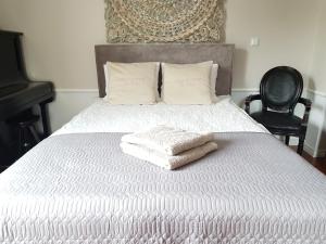 Posteľ alebo postele v izbe v ubytovaní BE WELL 3-Rooms Apartment with Parking and Garden