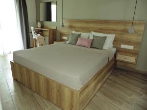 Ένα ή περισσότερα κρεβάτια σε δωμάτιο στο Βίλα Δάφνη +38 φωτογραφίες