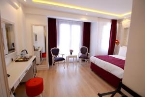 Ein Bett oder Betten in einem Zimmer der Unterkunft Albinas Hotel Old City