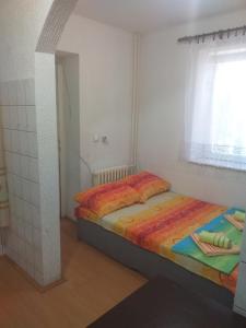 Ένα ή περισσότερα κρεβάτια σε δωμάτιο στο Hostel Corner 021