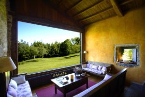 A seating area at Casa do Castelo de Andrade
