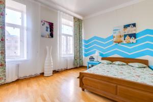 Katil atau katil-katil dalam bilik di Apartment on Griboyedova 38