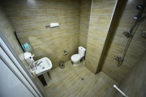 Koupelna v ubytování Orange Home Hotel