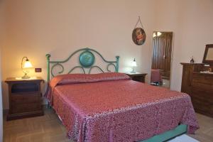 Posteľ alebo postele v izbe v ubytovaní Casa Donatella sulla costa degli Etruschi