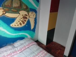 Cama o camas de una habitación en La Casa Azul Hostel