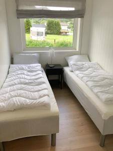Säng eller sängar i ett rum på Saltvold Leilighet nr 2