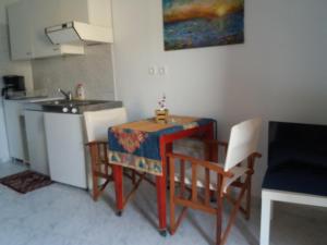 Η κουζίνα ή μικρή κουζίνα στο apartment in poros