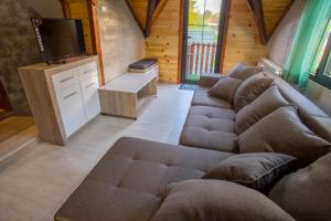 Predel za sedenje v nastanitvi Apartmani Restoran Durmitor