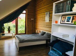 Voodi või voodid majutusasutuse Room in a Scandinavian Style House toas