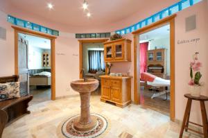 Ένα ή περισσότερα κρεβάτια σε δωμάτιο στο Hotel Gianna