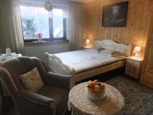 Una cama o camas en una habitación de Willa Katarzynka