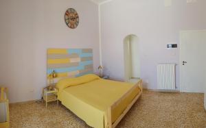 Postel nebo postele na pokoji v ubytování Maridea - Camere con vista al Porto