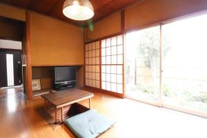 A television and/or entertainment centre at Saitama Niiza House / Vacation STAY 4274