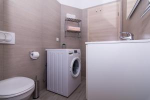 Kúpeľňa v ubytovaní Apartman Sun Solin
