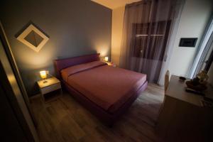 Postel nebo postele na pokoji v ubytování La Tanchetta + 31 fotografií