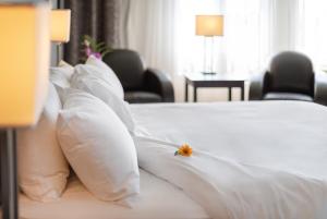 Postelja oz. postelje v sobi nastanitve Imperia Hotel & Suites Saint-Eustache