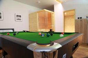 A pool table at Blue Door Apartment Ground Floor