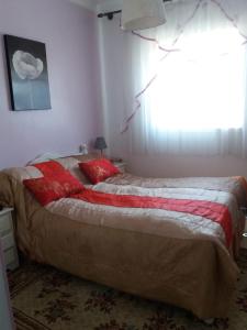 Tempat tidur dalam kamar di Martil Complexe Ryad Sofia