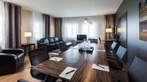 Predel za sedenje v nastanitvi Imperia Hotel & Suites Saint-Eustache