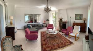 Χώρος καθιστικού στο VILLA SANTINE AVEC TERRASSES et VUE PANORAMIQUE meublé tourisme 4 étoiles