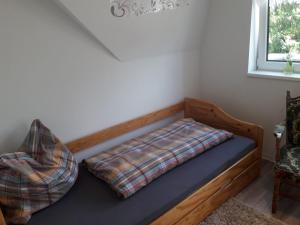Uma cama ou camas num quarto em Ferienwohnung Maria