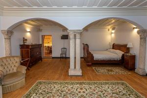 En eller flere senge i et værelse på Quinta da Foz