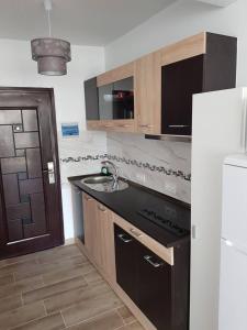 Kuchyň nebo kuchyňský kout v ubytování LOFT PARAISO