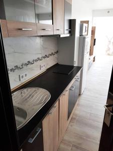 Kuchyň nebo kuchyňský kout v ubytování LOFT PARAISO