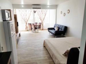 Postel nebo postele na pokoji v ubytování LOFT PARAISO